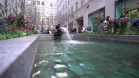 New York , NY , United States - 04 13 2022: Water fountain garden at front of Rockefeller centre in New York City