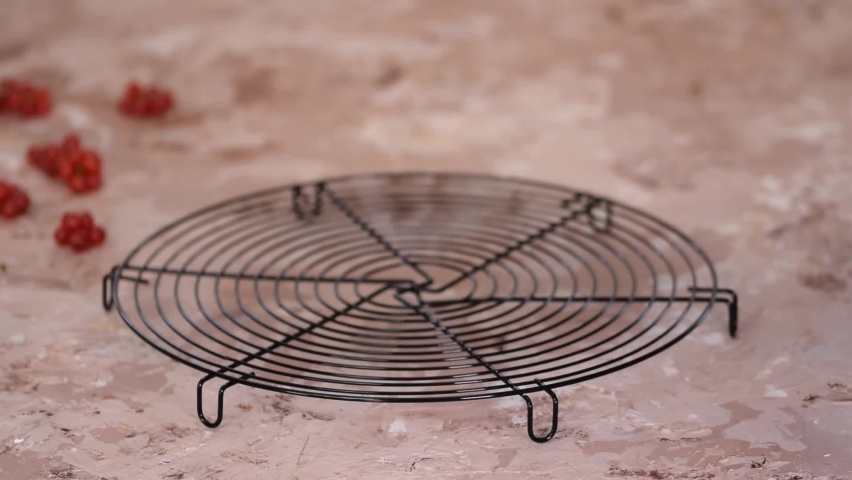 Freshly baked red currant muffins in a baking tray.