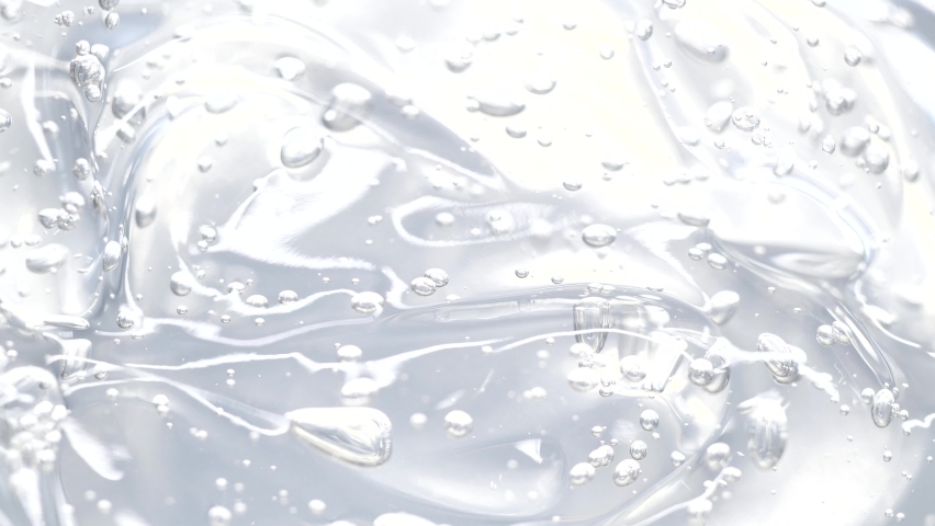 Macro white transparent cosmetic serum gel, cream, fluid texture with air bubble, a Healthcare Video by claires