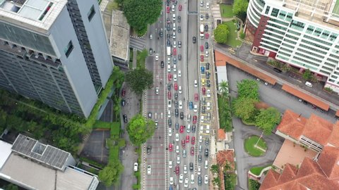 Top down birds eye view capturing the congested traffics on jalan tun razak in downtown kuala lumpur at peak hour, malaysia southeast asia.