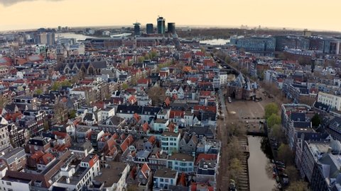 Aerial View of Red Light district and Waag - Weigh house in Nieuwmarkt area of Amsterdam, Netherlands