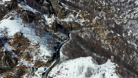 Aerial View Of Serpentine Mountain Road That Leads To Morterone, On Snow With Hairpin Bends. 
Morterone is a little municipality in province of Lecco, Lombardia, Italy