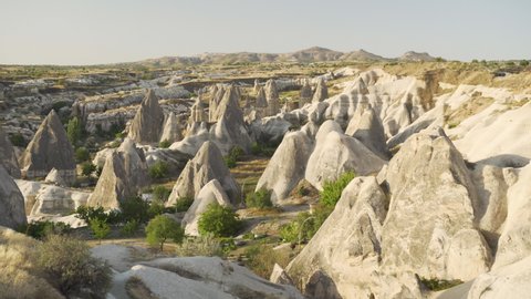 Awesome aerial view of rock formations called the Fairy Chimneys in Cappadocia, Turkey. Fabulous landscape of Goreme Historical National Park. Cappadocia is a popular tourist destination of Turkey.