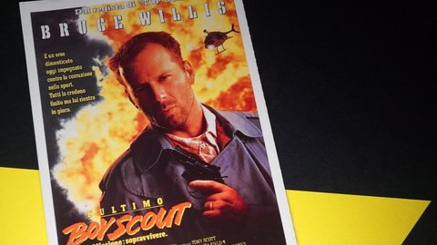 Rome, Italy - April 01, 2022, detail of the postcard of the movie poster of The Last Boy Scout, Mission to survive, directed by Tony Scott and starring Bruce Willis and Damon Wayans.