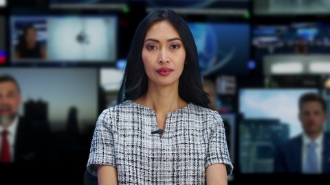 TV Live News Program with Female Presenter Reporting. Television Cable Channel Evening Show about Daily Events. Mockup Network Broadcasting Playback in Newsroom Studio. Medium Close-up Static Shot