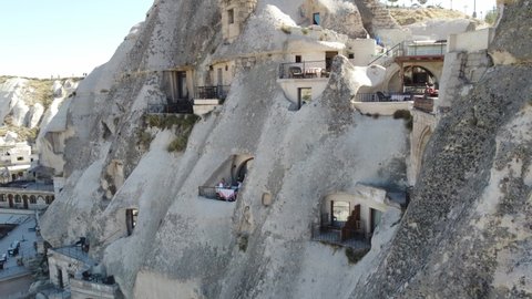 Beautiful morning in Cappadocia - couple and their romantic breakfast in Goreme. Drone video.