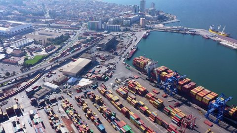 IZMIR, TURKEY - OCT. 24, 2019: Loading ships in the port. Industrial city. Aerial view of Izmir port and Aegean sea. Gulf of Izmir, view from drone.