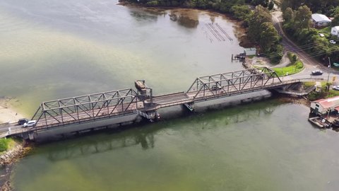 Princess highway crossing Wagonga inlet in Narooma town – aerial flying 4k.
