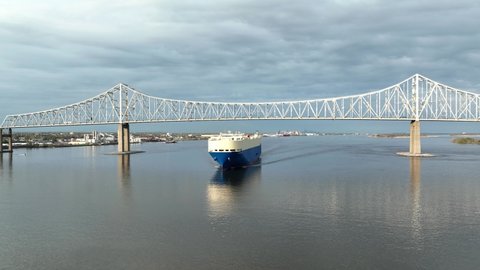 Aerial View of Automobile Carrier Ship Passing Under Commodore Barry Bridge in Chester Pennsylvania