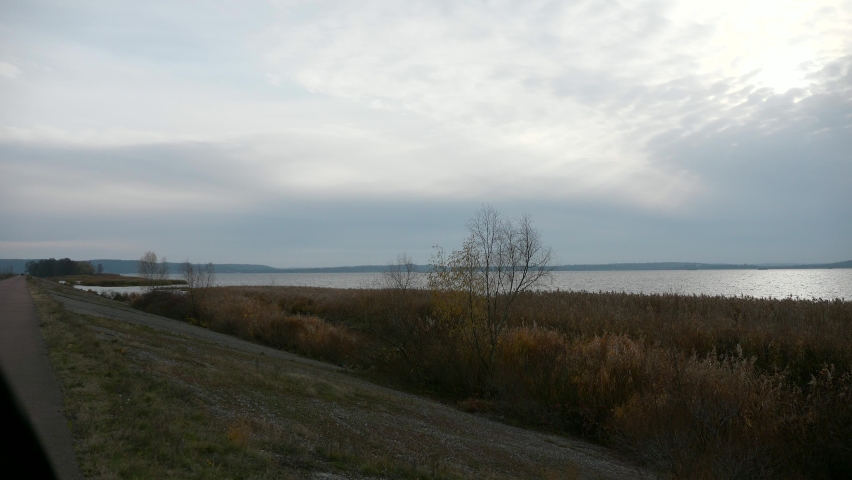 Power Plant Pipes near Dnieper Dnipro River Reservoir Ukraine Europe. Overcast Cloudy Sky. Autumn Winter Season. 2x Slow motion 60 fps 4K