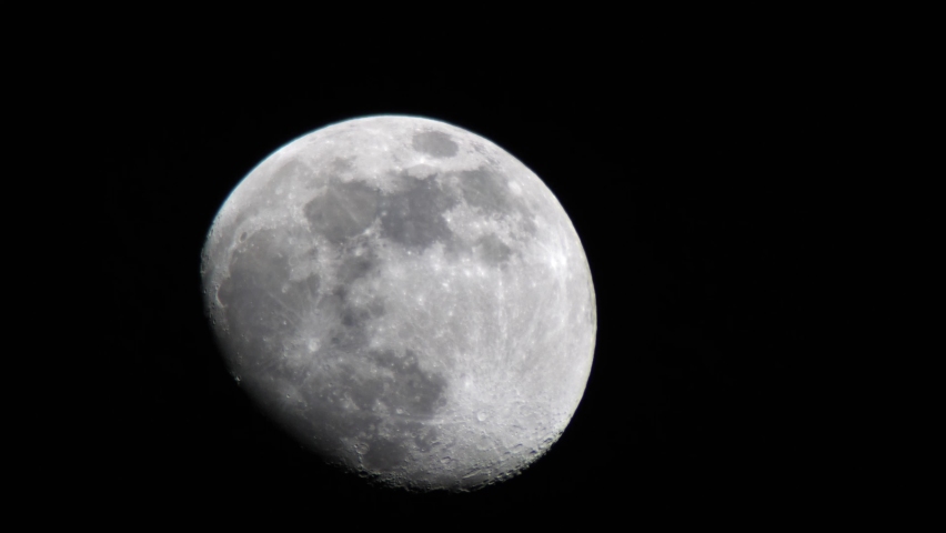 Detail View Of Last Quarter Moon Moving In The Darkness Of Night. - close up