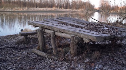 abandoned recreational area on the beach. table by the river