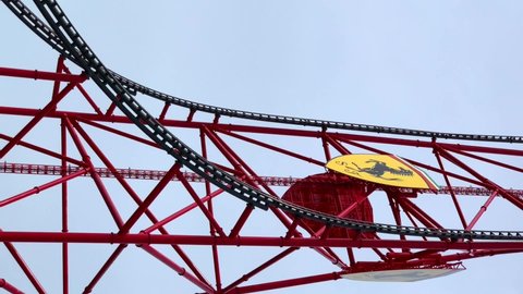 Salou, Spain - April 2022: Vertical video. Red Force, the highest and fastest rollercoaster in Europe at Ferrari Land theme park.
