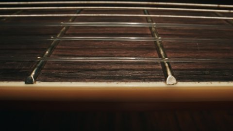 Classical fretboard six-string electric guitar.