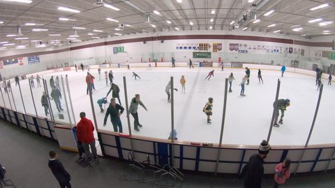 Denver, Colorado, USA-January 12, 2020 - Public ice skating session on the indoor ice skating rink.