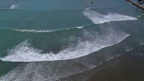Aerial Shot Of Surfers Surfboarding On Sea Waves At Vacation - Dana Point, California