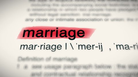 Sukabumi, Indonesia, April 25 2022: The Word Marriage Red Highlighted in a Dictionary Animation