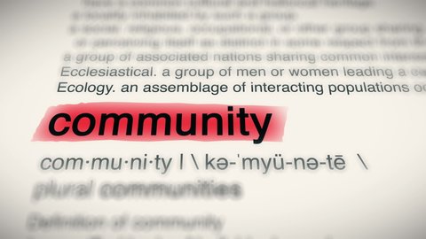 Sukabumi, Indonesia, April 25 2022: The Word Community Red Highlighted in a Dictionary Animation