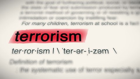 Sukabumi, Indonesia, April 25 2022: The Word Terrorism Red Highlighted in a Dictionary Animation