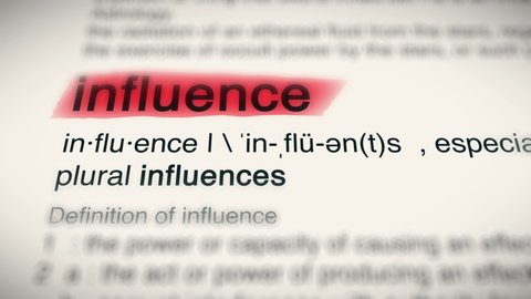 Sukabumi, Indonesia, April 25 2022: The Word influence Red Highlighted in a Dictionary Animation