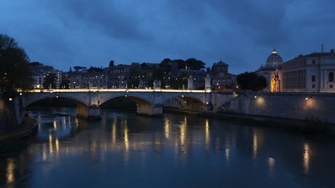 Rome, Italy- April 24, 2022: Ponte Vittorio Emanuele II or Ponte Vittorio is the bridge over the Tiber in Rome, Italy. Night time lapse.