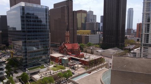Dallas , United States - 04 26 2022: Aerial view towards the Cathedral Shrine of the Virgin of Guadalupe, in Dallas, USA - approaching, drone shot