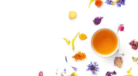 Motion animation with a cup of tea,ginger,turmeric,roses and flowers. Tea animation on the white background. Top view 4k.