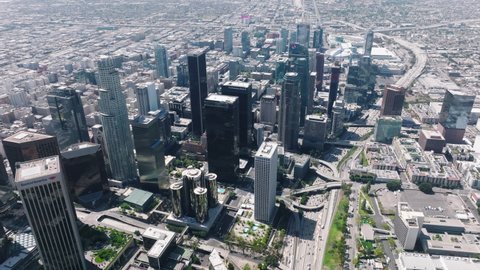 Los Angeles USA Apr 2022. Financial and residential buildings cityscape view on sunny summer day, 4K footage. Aerial drone footage of Hollywood Downtown skyscrapers on cinematic urban city background