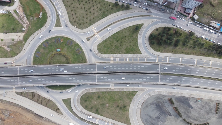 Aerial drone view of vehicle density at the intersection, vehicle traffic on the main road, images of vehicles at intersections and crossroads