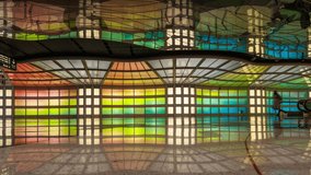 Passengers passing the illuminated tunnel at Chicago O'Hare in USA - Powered by Shutterstock - Get 15% off with code: PIKWIZARD15