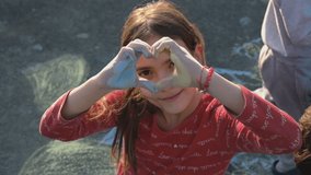 Children draw with chalk on asyalte. Selective focus. - Powered by Shutterstock - Get 15% off with code: PIKWIZARD15