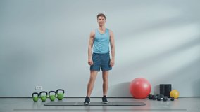 Online Fitness Course Video with Young Athletic Personal Trainer Explaining Core Strengthening Workout with Plank Position on a Ball. Fit Man Showing How to Balance the Body. HUD Interactive Graphics.