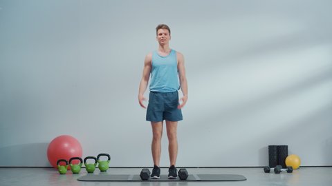 Fitness Course Live Stream Video with Young Athletic Personal Trainer Explaining Strengthening Workout Routine with Dumbbells. Fit Online Coach Showing How to Burn Fat for Beginners.