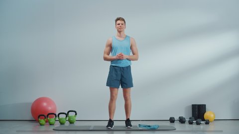 Online Fitness Course Video with Young Athletic Personal Trainer Explaining Core Strengthening Workout Routine with a Rubber Band. Fit Man Showing Exercises for Beginners. UX Interactive Graphics.