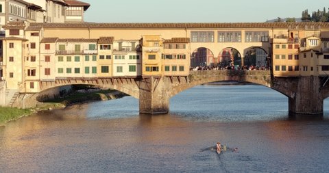 Kayaking on the Arno River near Ponte Vecchio In Florence Italy