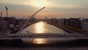 River Liffey in the city of Dublin - aerial view in the evening -drone footage