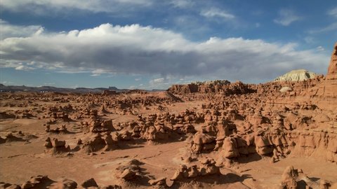 Cinematic aerial to the National Park Utah, red rocky spires, natural phenomena, landscape of another planet, scenic Utah. Drone footage