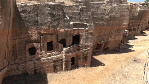 Dara, Mardin, Turkey - 16th of June 2021: 4K Viewing rock caves of the ancient Dara town
