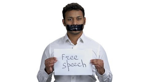 Indian man with taped mouth, front view. Silenced man holding card with inscription Free speech. Isolated on white background.