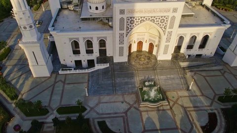 Mosque Pride of Muslims named after the Prophet Muhammad in Shali, Chechen Republic, Russia. Drone view. The largest mosque in Europe next to the Shali City high-rise complex
