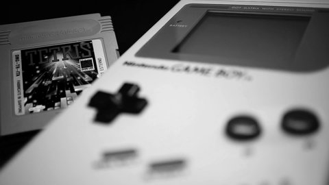 Rome, Italy - May 06, 2019: Game Boy and cult game cartridge, TETRIS. declared one of the ten most important video games ever by Henry Lowood of Stanford University, in 2007