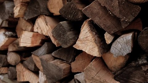 Firewood stacked in a pile for winter heating in the stove
