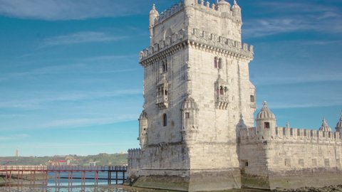 Belem Tower is a fortified tower located in the civil parish of Santa Maria de Belem in Lisbon, Portugal timelapse with clouds and fast moving shadows at the day time