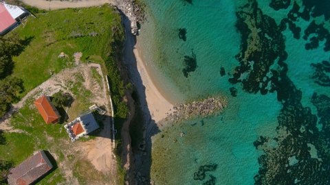 Aerial view of  byzantine tower and beach of village Nea Fokea in peninsula Kassandra Halkidiki Greece