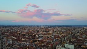 Milan city skyline aerial view at dawn flies backwards. The theatrical performance shot from the Milan cityscape in the fall.
Aerial footage. A short flight that shows the city of Milan skyscrapers 