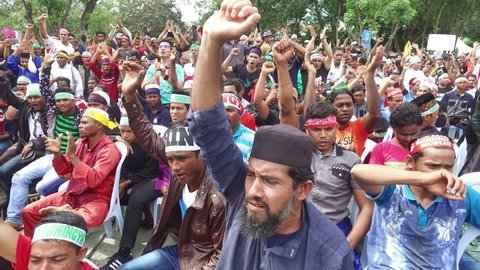 Kuala Lumpur , Malaysia - 4th December 2016 : Myanmar ethnic Rohingya Muslims shout slogans during  the Solidarity Assembly for Rohingya at Stadium Titiwangsa.