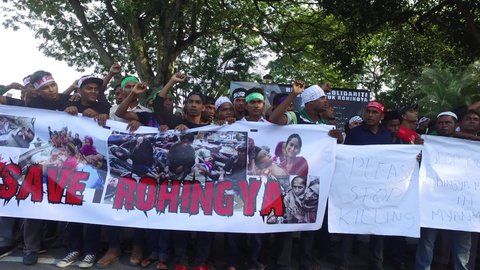 Kuala Lumpur , Malaysia - 4th December 2016 : Myanmar ethnic Rohingya Muslims hold placards during the Solidarity Assembly for Rohingya at Stadium Titiwangsa.