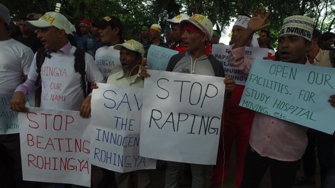Kuala Lumpur , Malaysia - 4th December 2016 : Myanmar ethnic Rohingya Muslims hold placards during the Solidarity Assembly for Rohingya at Stadium Titiwangsa.