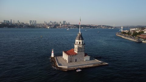 Awesome aerial view of the Maiden's Tower (Leander's Tower) and the Bosporus in Istanbul, Turkey. Drone flying over the Bosporus. Istanbul is a popular tourist destination in the world.