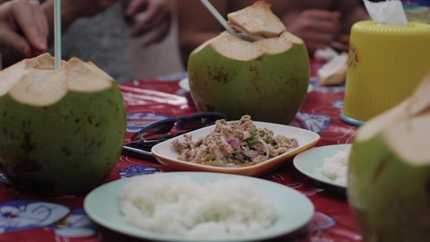 Larb Moo Thai Street Food Spicy Minced Pork with White Rice and Coconuts Friends Eating Together Koh Samui Thailand